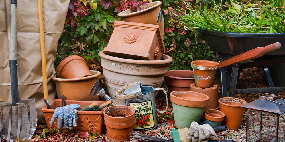 stacked up garden pots for winter Wallace's Wallace's Garden Center