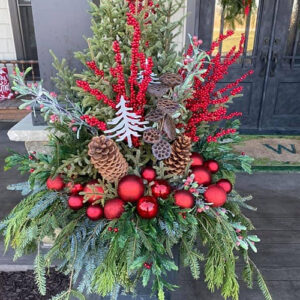 Wallaces Garden Center-Iowa-Decorate Your Door for the Holidays with Fresh Greenery-red theme holiday urn